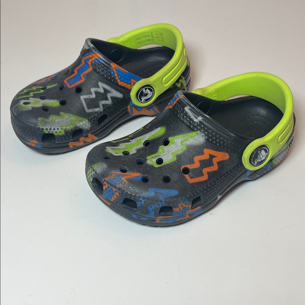 CROCS Kids size C 7 Black with Neon Green, Orange, Blue & lighting bolt design